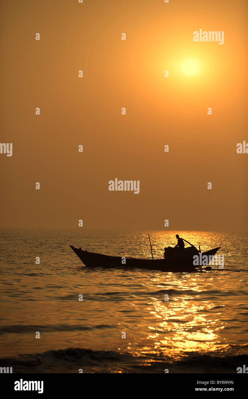 Fishing boat at sunset in Bangladesh Stock Photo