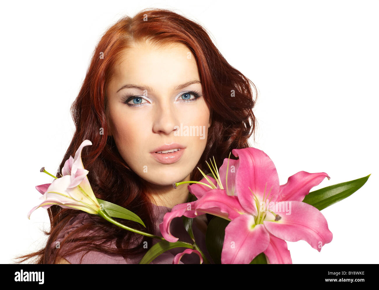 Portrait of a happy women with flowers Stock Photo