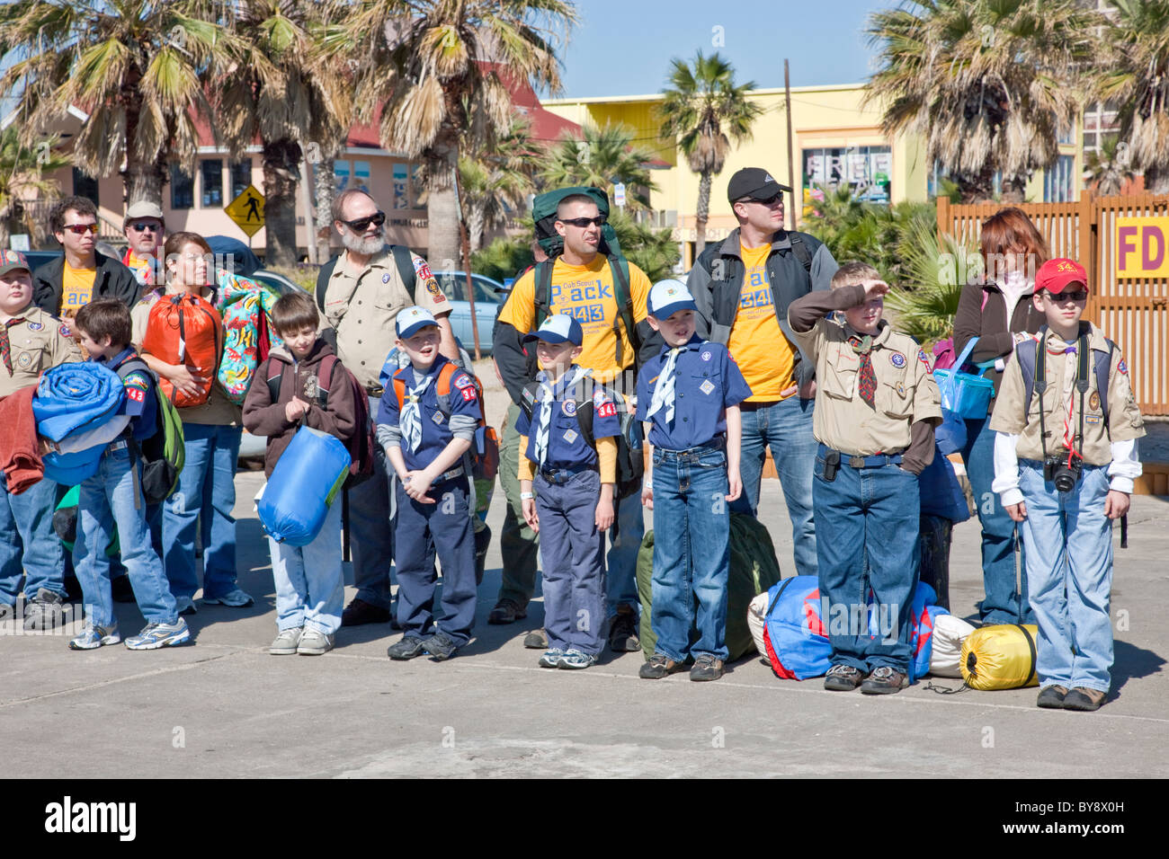 Boy & Cub Scouts with leaders, waiting to board USS Lexington, Texas Stock Photo
