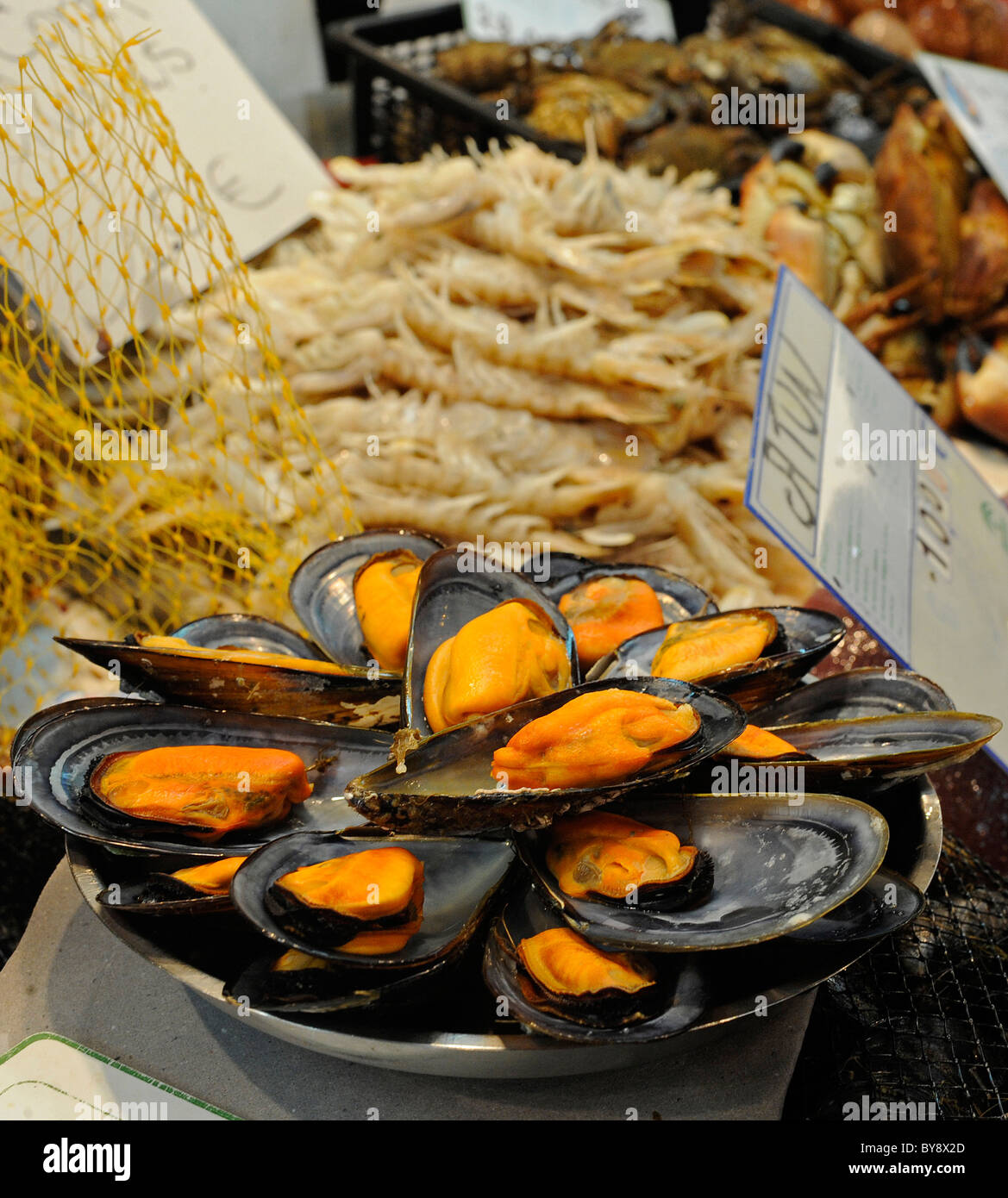 Mussels and other seafood are pictured at a fish booth on a fish market in Jerez de la Frontera