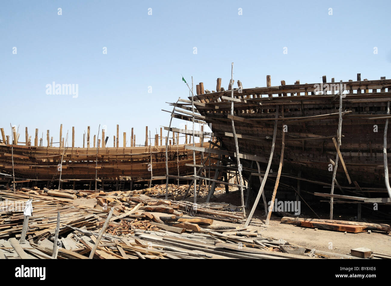 Traditional shipbuilding in Mandvi (Kutch, India). The ships here are still built using traditional methods. Stock Photo