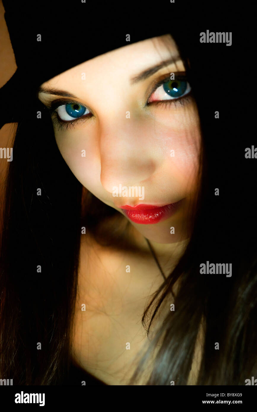 Portrait of the beautiful woman in a hat Stock Photo - Alamy
