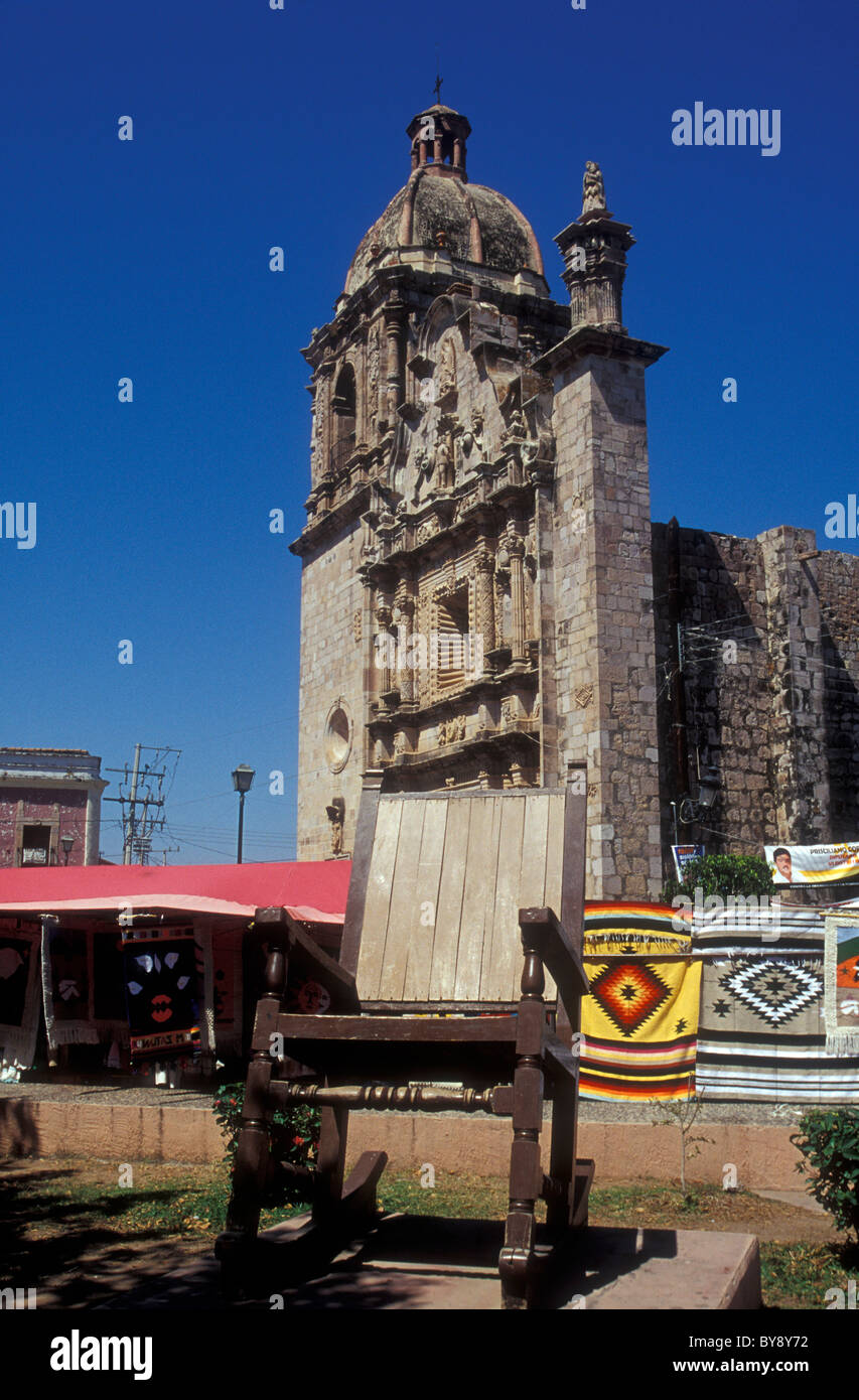 Giant rocking chair in front of 18th-century Church of San Sebastian in the Spanish colonial mining town of Concordia near Mazatlan, Sinaloa, Mexico Stock Photo