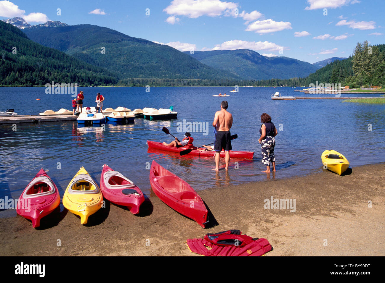 Whistler, BC, British Columbia, Canada - Kayakers kayaking in Kayaks on Alta Lake, West Coast Scenic, Summer Stock Photo