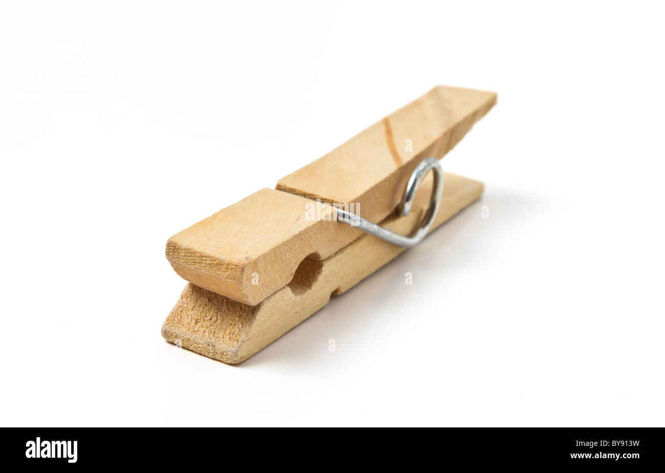 Wooden sprung Clothes Peg from low perspective isolated on white. Stock Photo