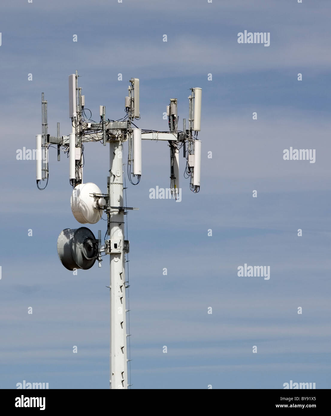 Tower with several different types of communications gear Stock Photo