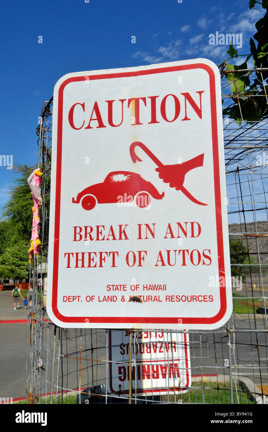 Warning Sign about car theft and break in Honolulu Hawaii Oahu Pacific Ocean Stock Photo