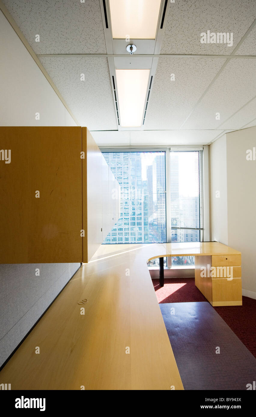 Empty office with desk and credenza Stock Photo