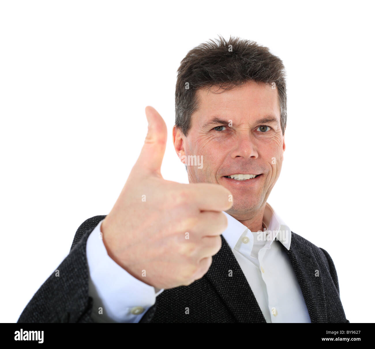 Attractive middle-aged man making thumbs up sign. All on white background. Stock Photo