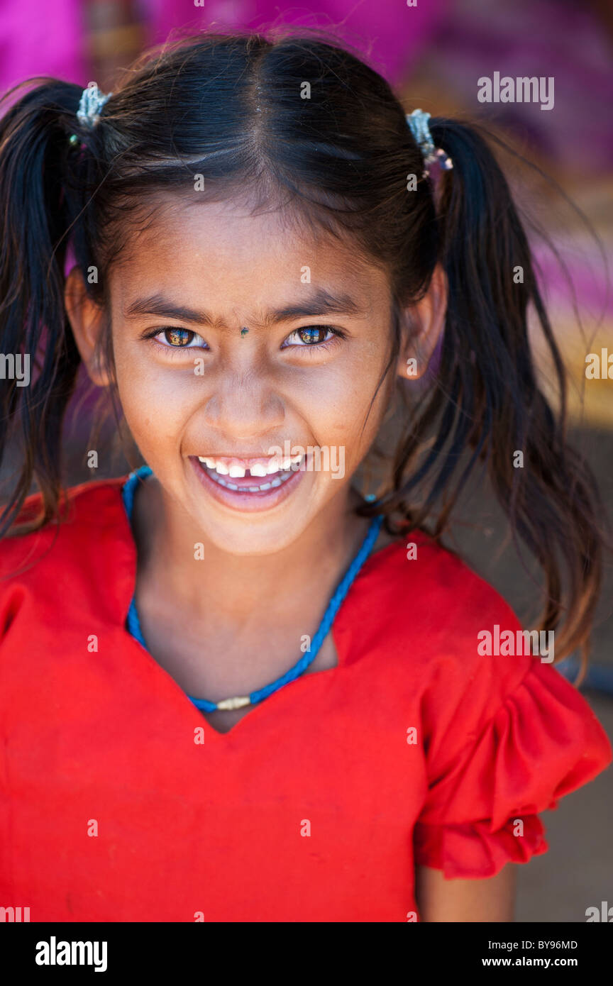 Happy young poor lower caste Indian street girl smiling. Andhra Pradesh, Indi. Stock Photo