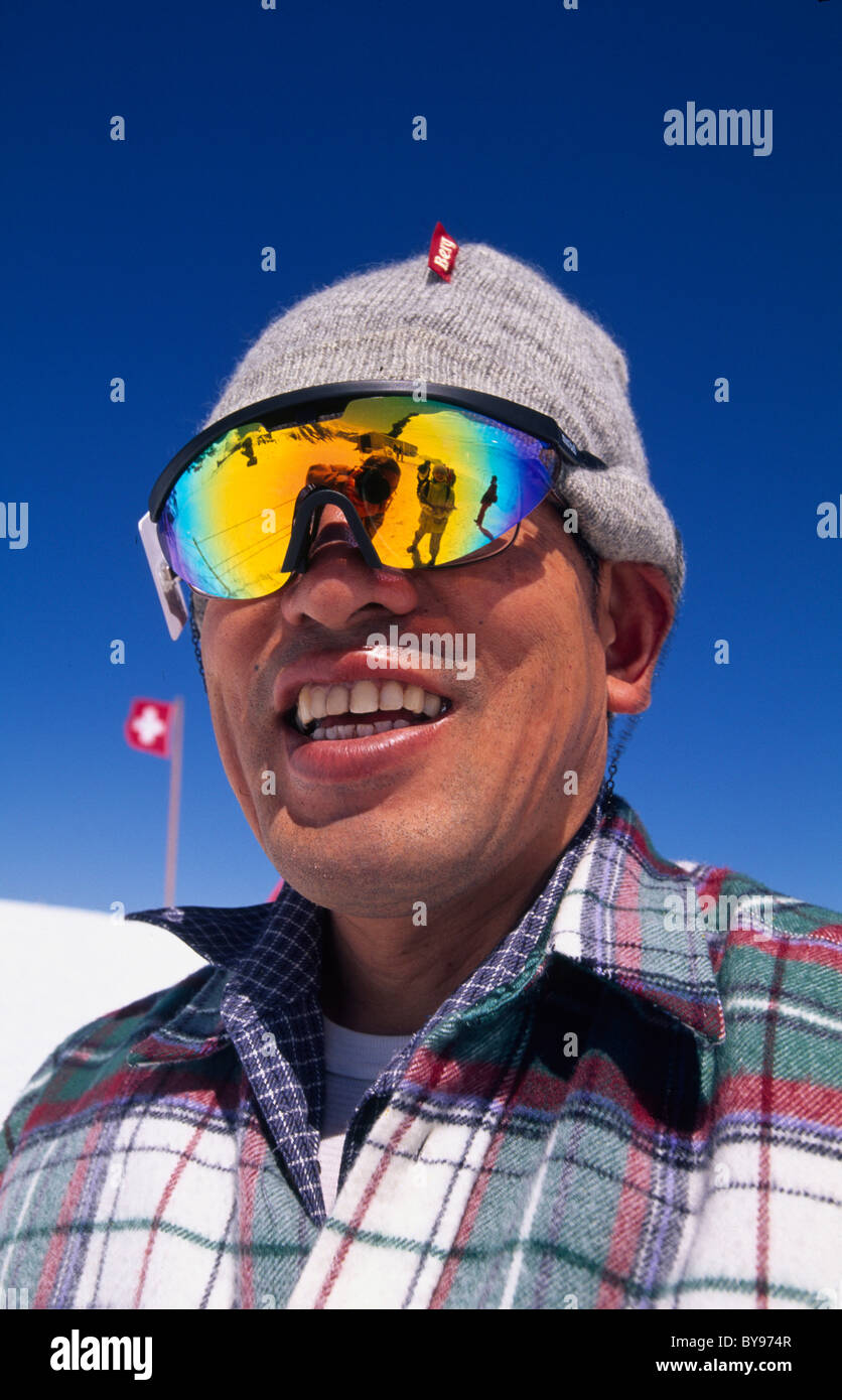 Tourist on Mount Jungfrau, Switzerland, World Heritage Stock Photo