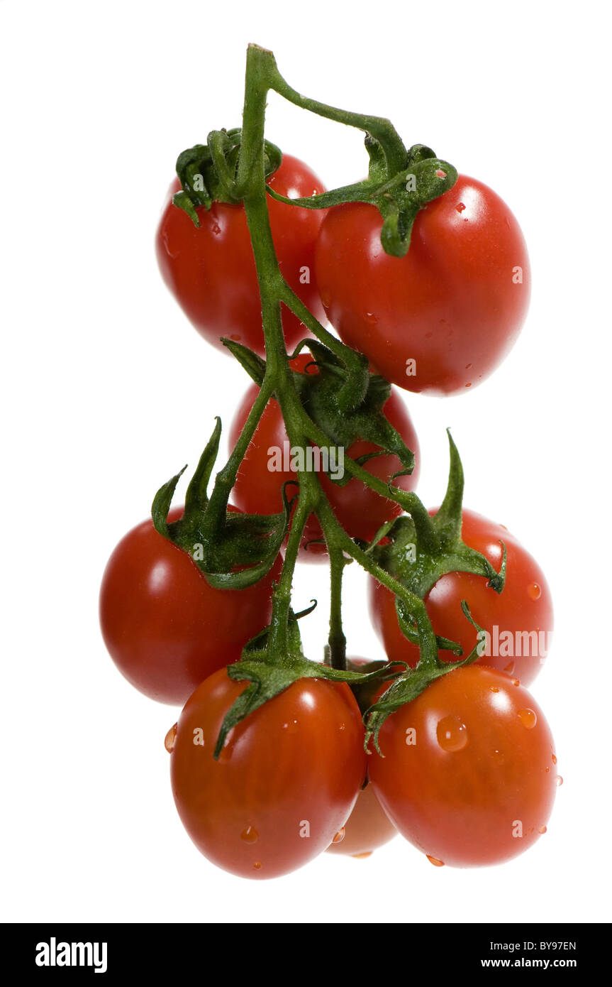 Cluster of fresh red ripe cherry tomatoes Stock Photo