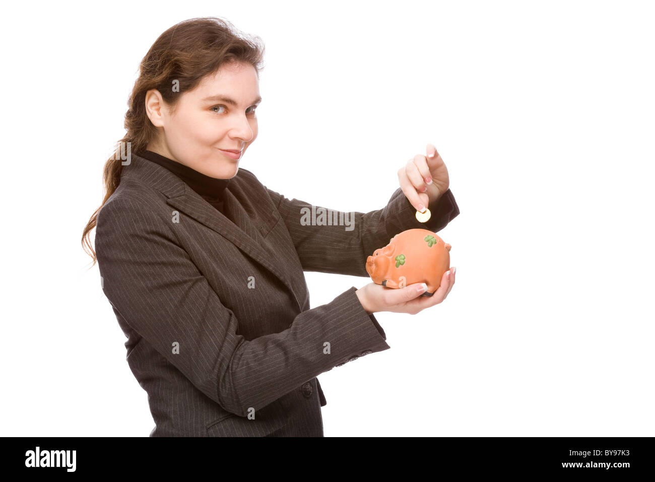 Full isolated portrait of a caucasian business woamn with piggy bank ...