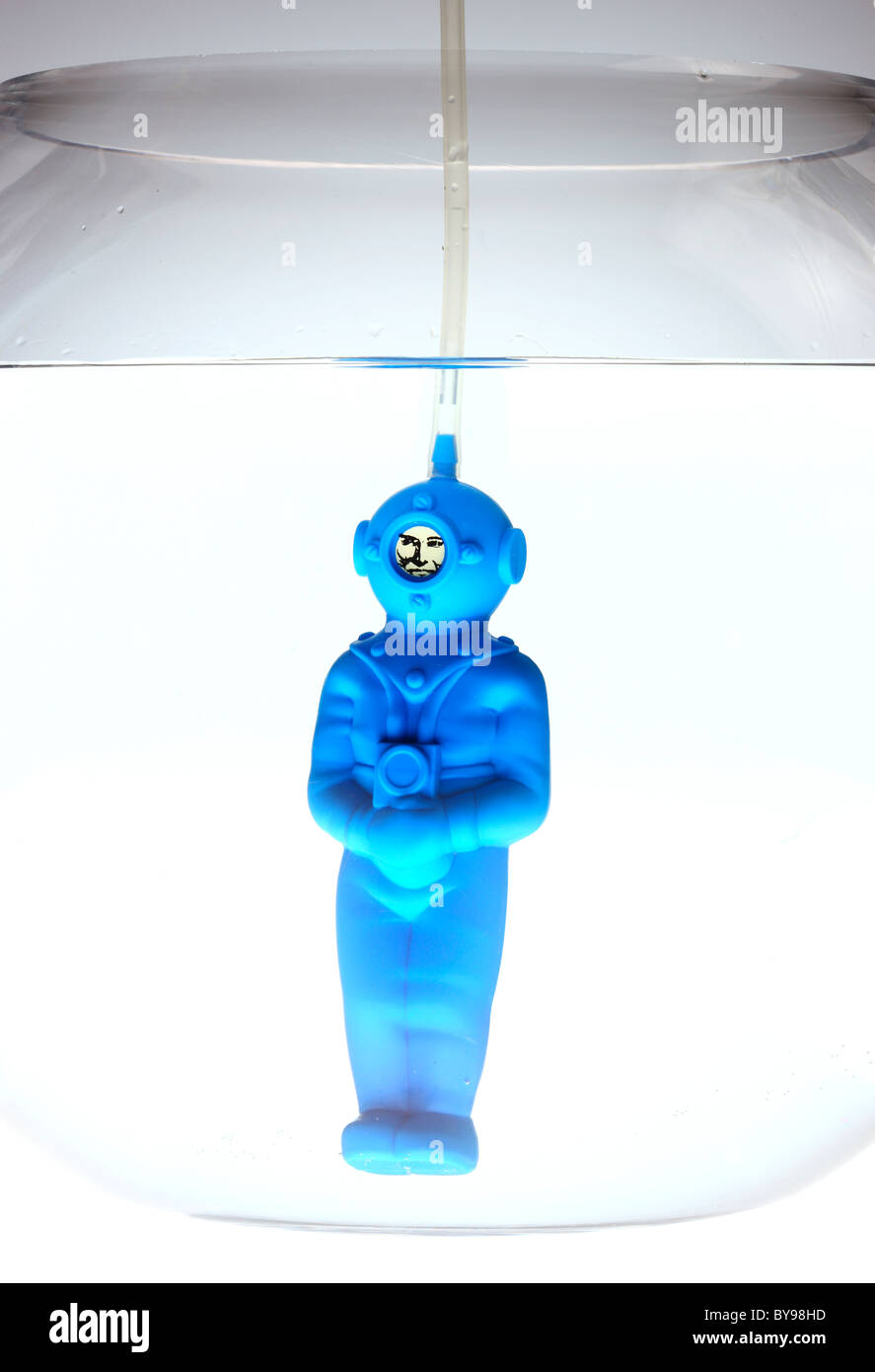 Blue, plastic diver, helmet diver, in a fish bowl Stock Photo Alamy