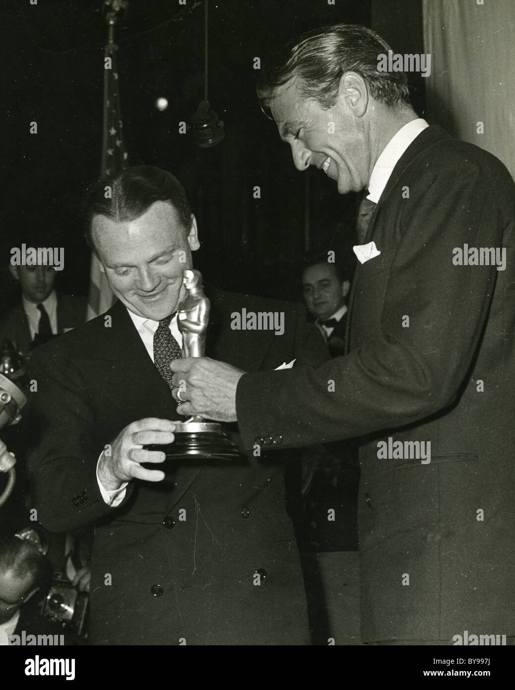 JAMES CAGNEY accepts his award for Best Actor from Gary Cooper at the