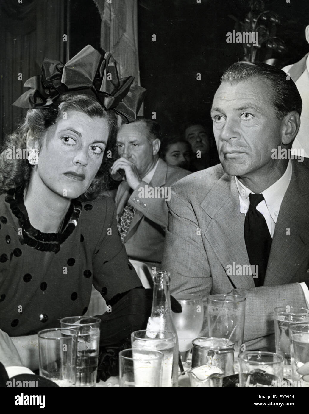 GARY COOPER (1901-1961) US film actor at the New York Stork Club with wife Veronica about 1943 Stock Photo