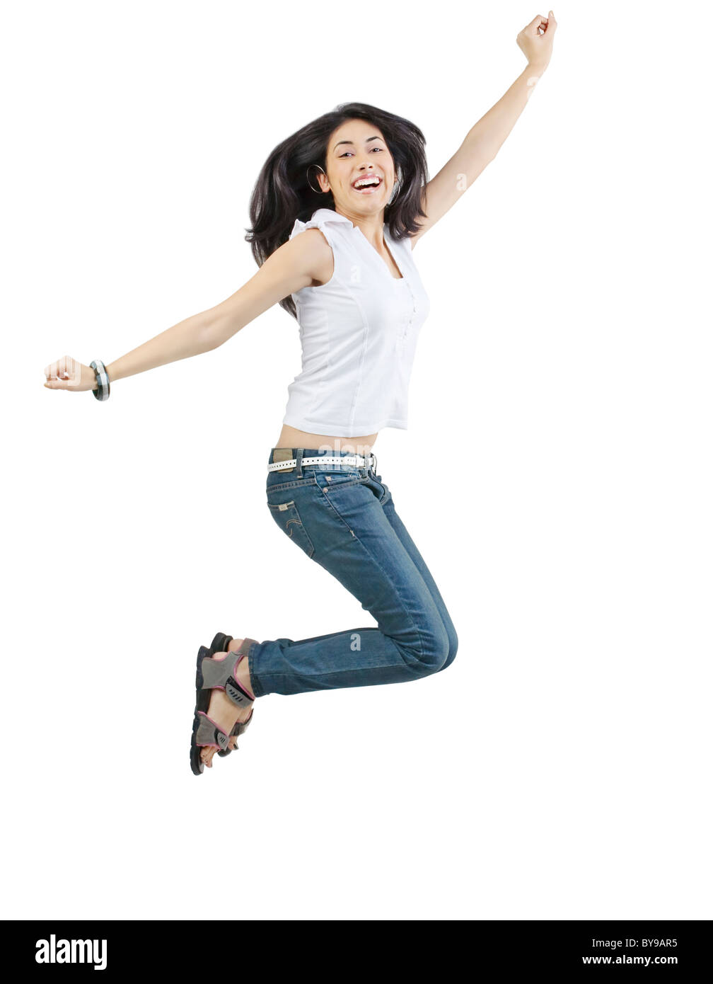 Girl jumping in the air Stock Photo
