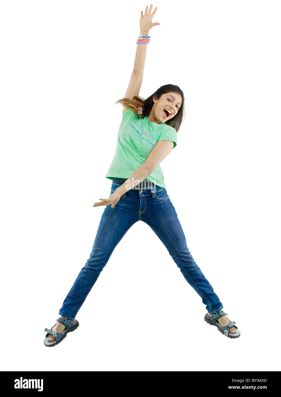 Girl jumping in the air Stock Photo