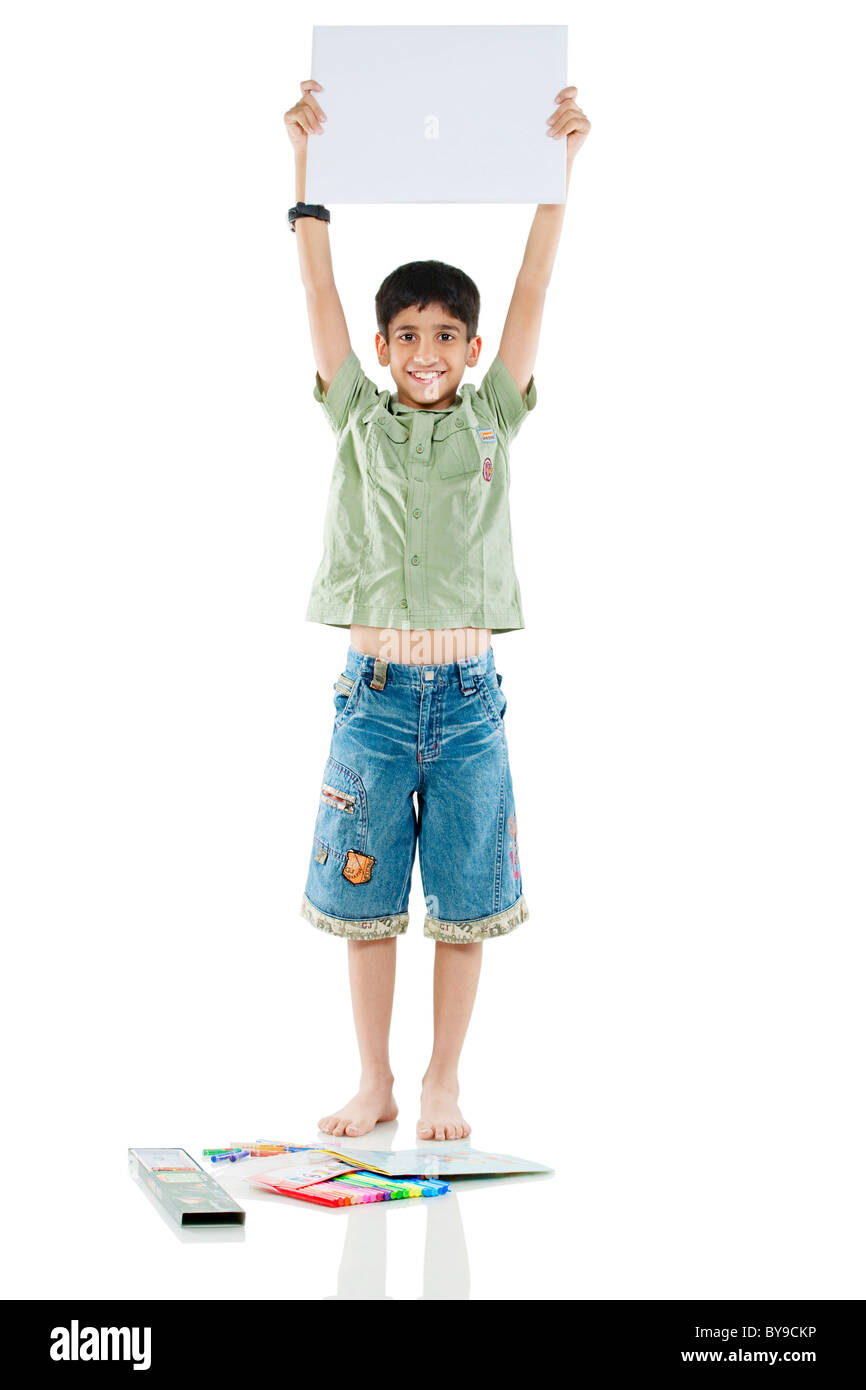 Boy holding a white board Stock Photo - Alamy