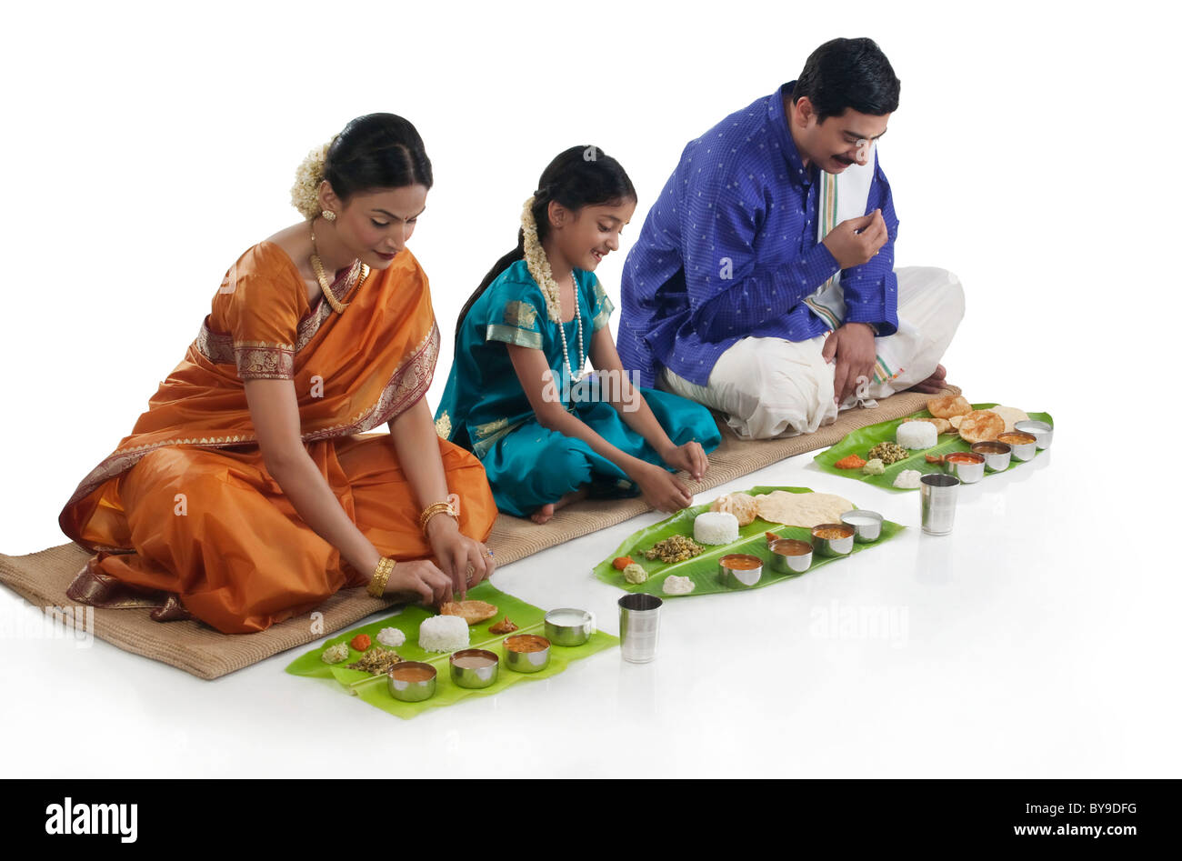 South Indian family having lunch Stock Photo - Alamy