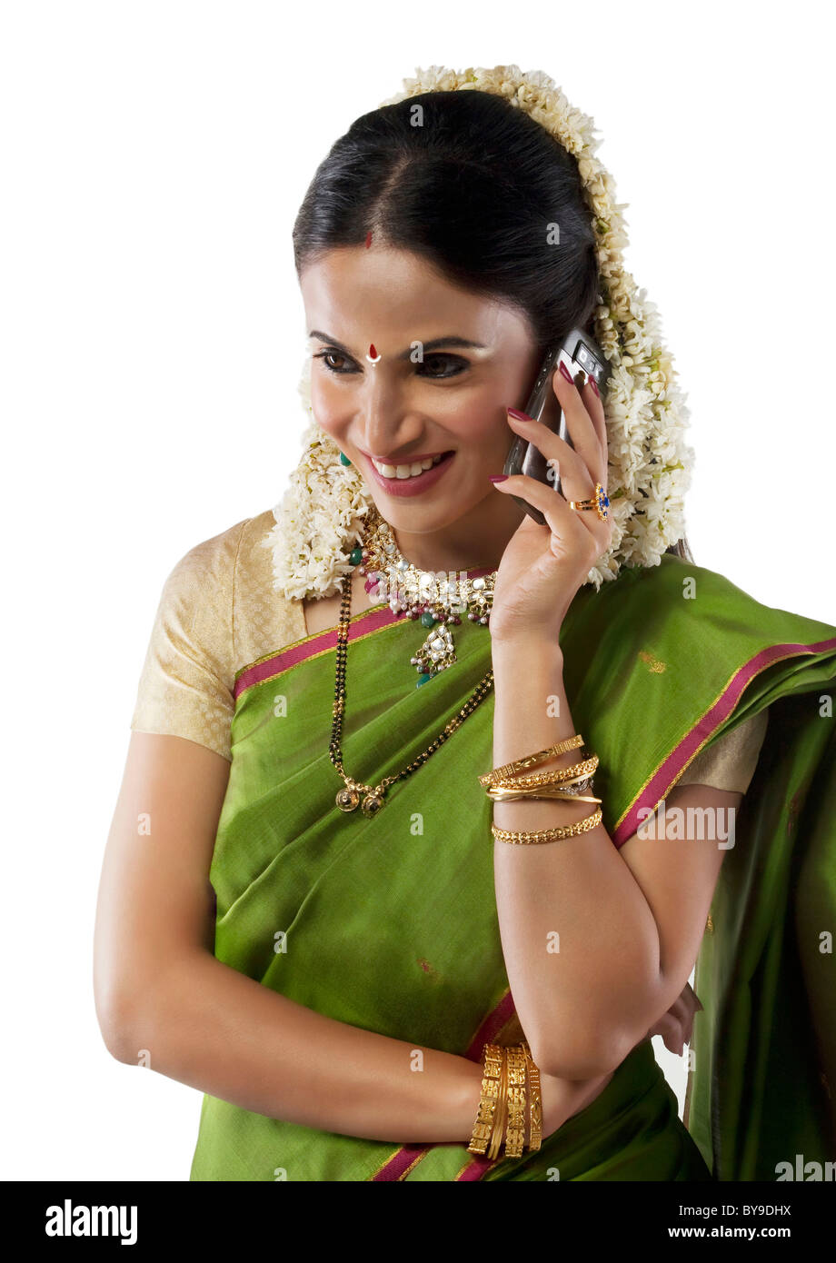 South Indian woman talking on a mobile phone Stock Photo - Alamy