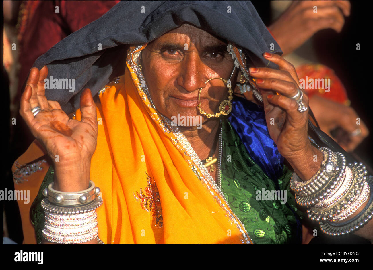 Woman wearing silver dress hi-res stock photography and images - Alamy