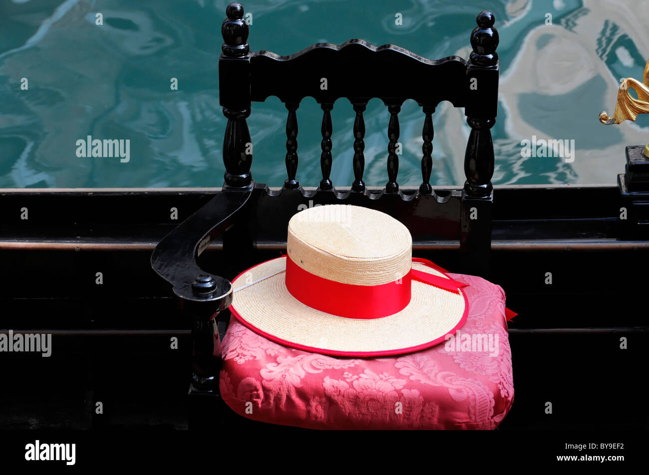 Gondolier's hat in a gondola, Grand Canal, Venice, Veneto, Italy, Europe Stock Photo