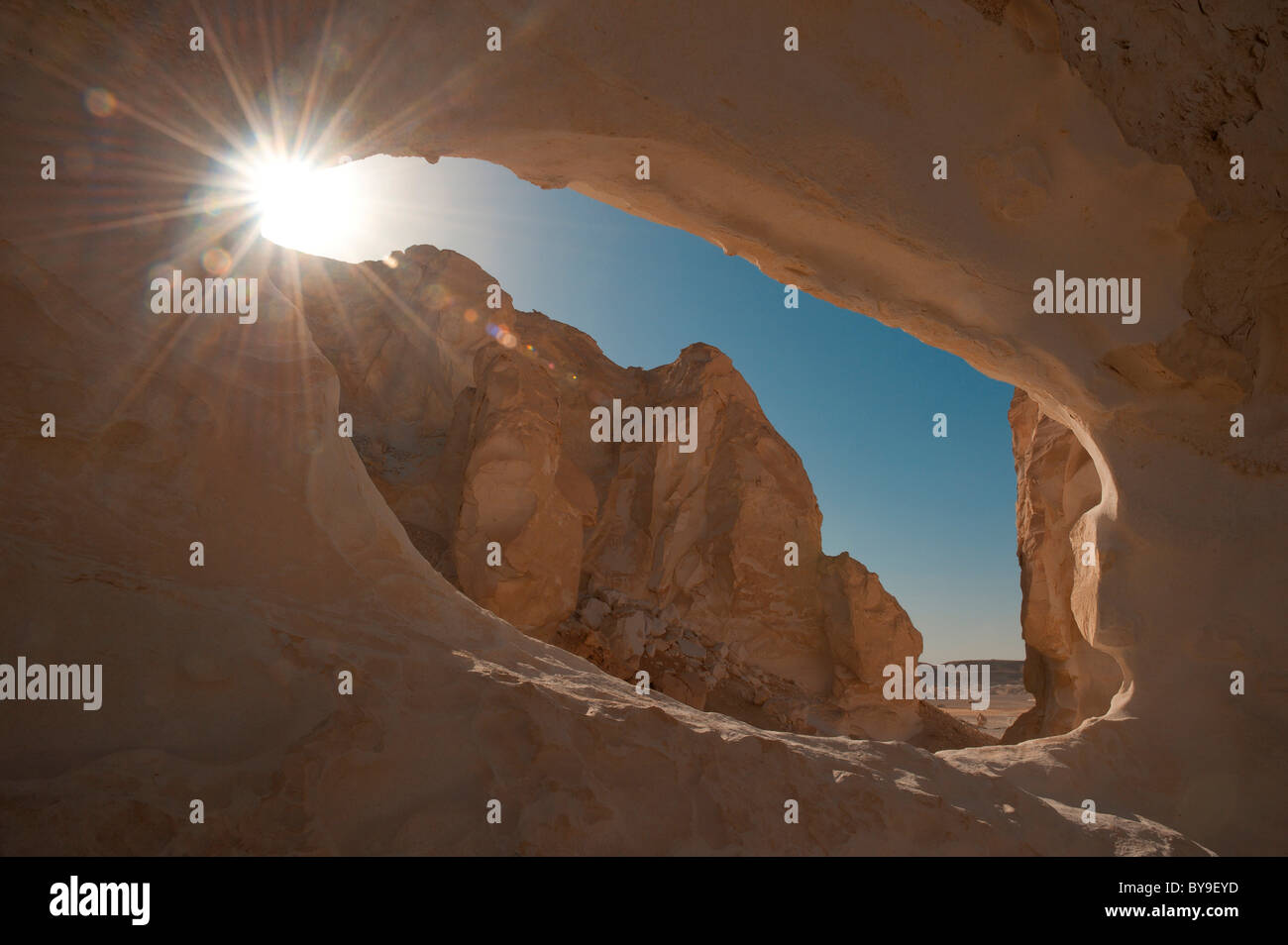 View through rock in the White Desert National Park, Westside region, Libyan desert, Sahara, Egypt, North Africa Stock Photo