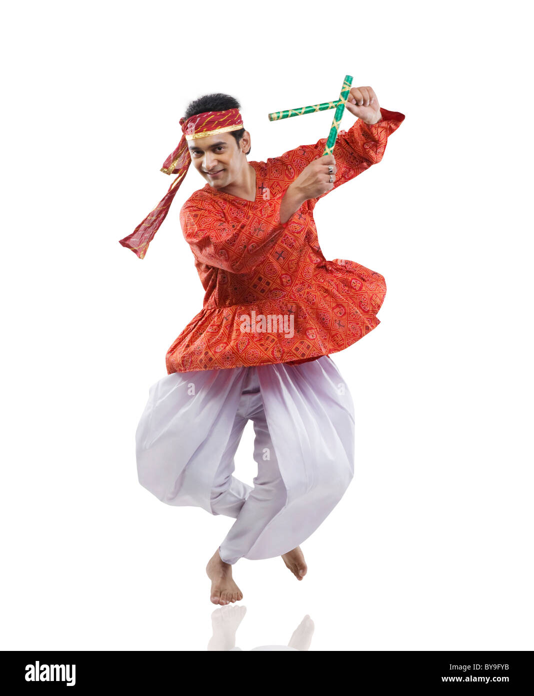 Gujarati man performing dandiya Stock Photo