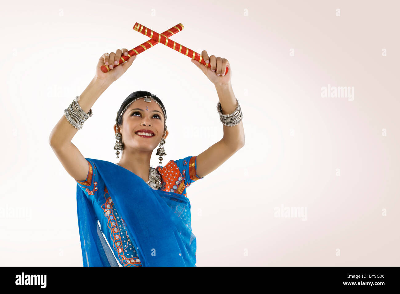 Women performing traditional dandiya dance hi-res stock photography and ...