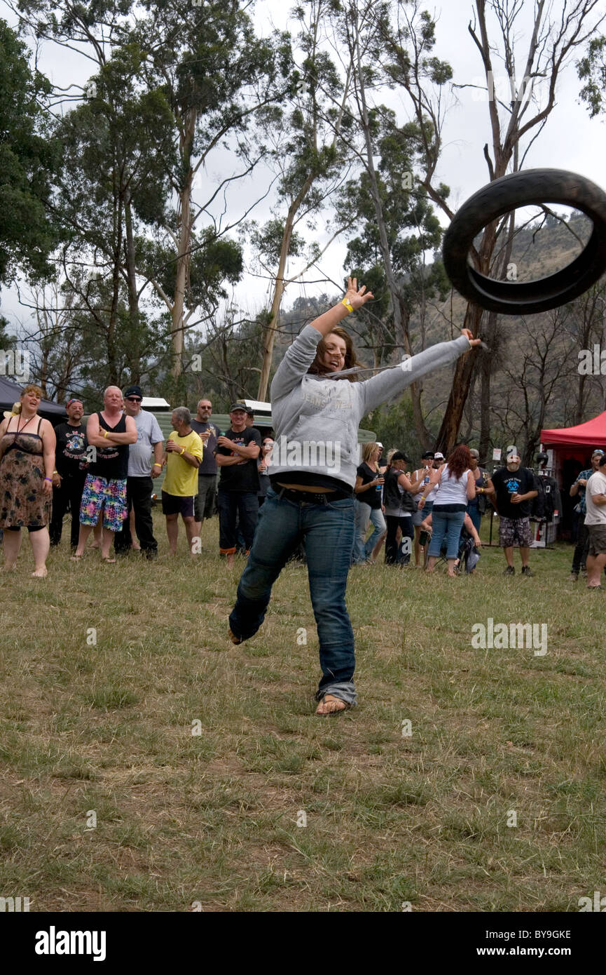 tire throw competition Stock Photo Alamy