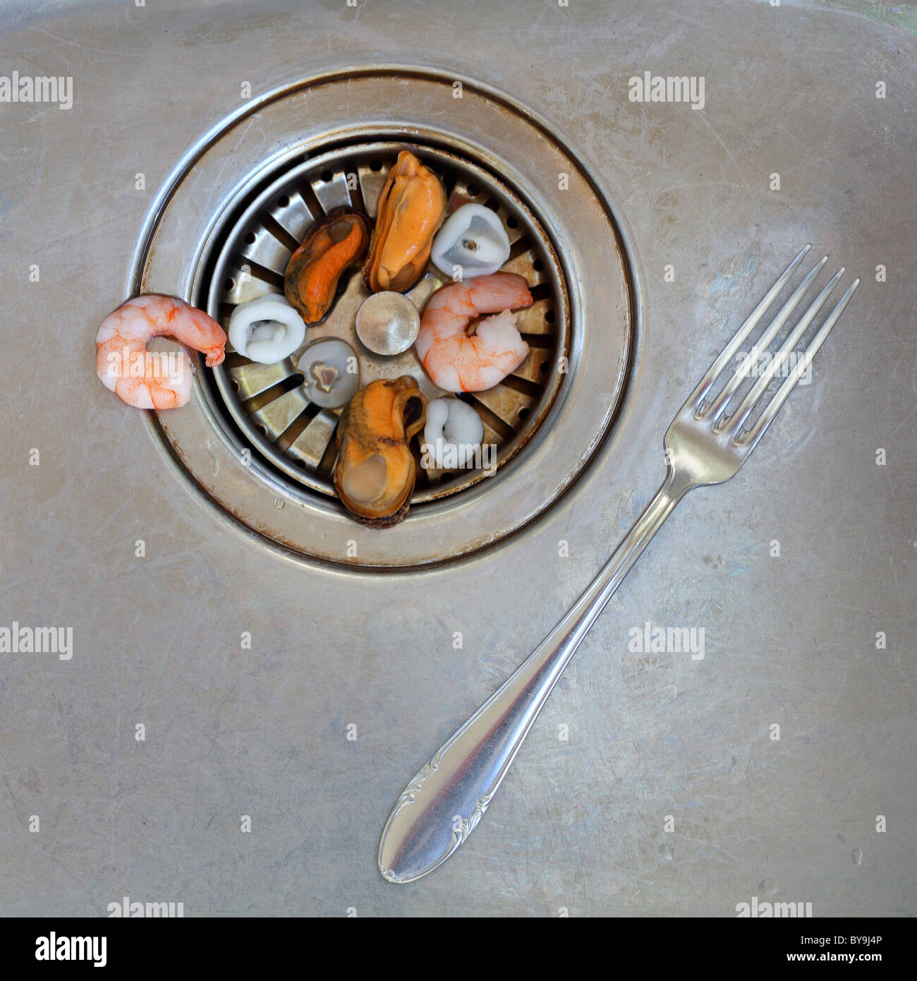 sink drain seafood leftovers Stock Photo