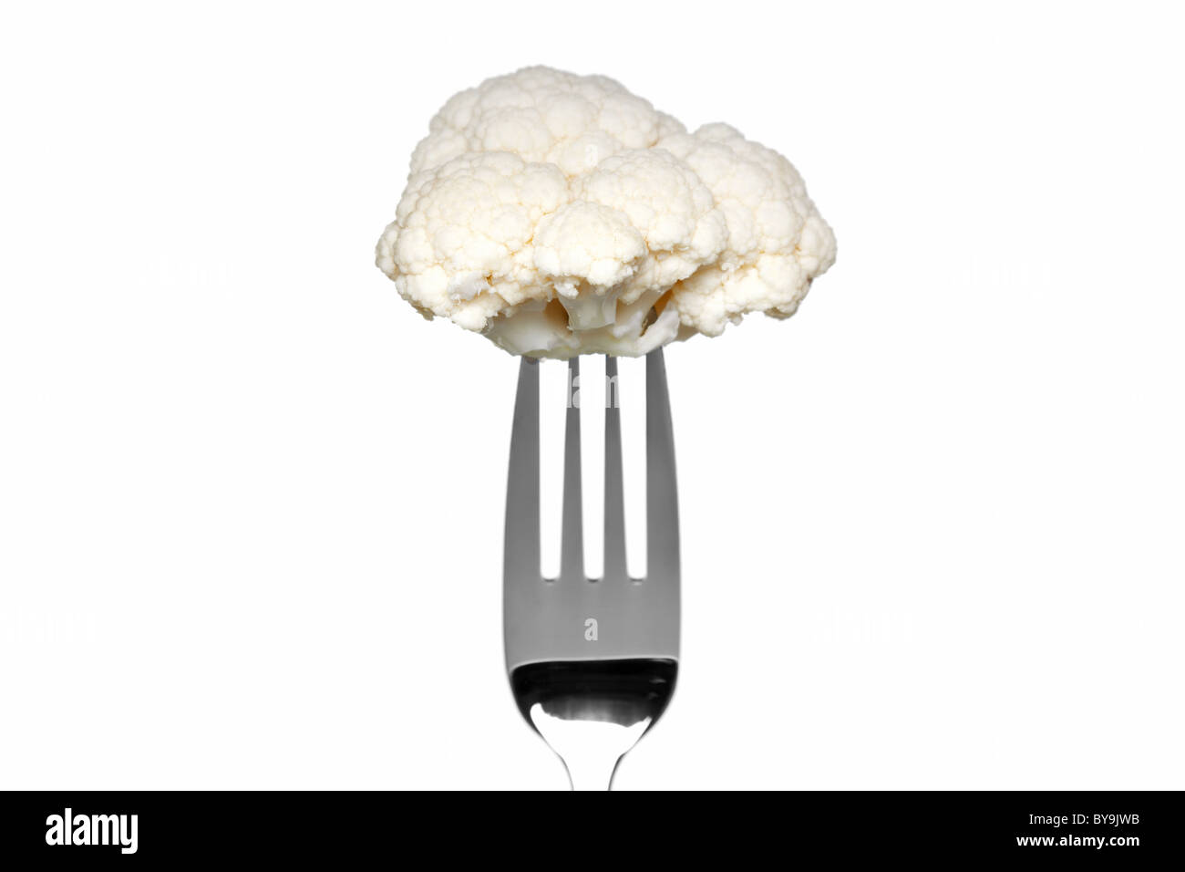 Photo of a cauliflower on a fork isolated on a white background, part of a series. Stock Photo