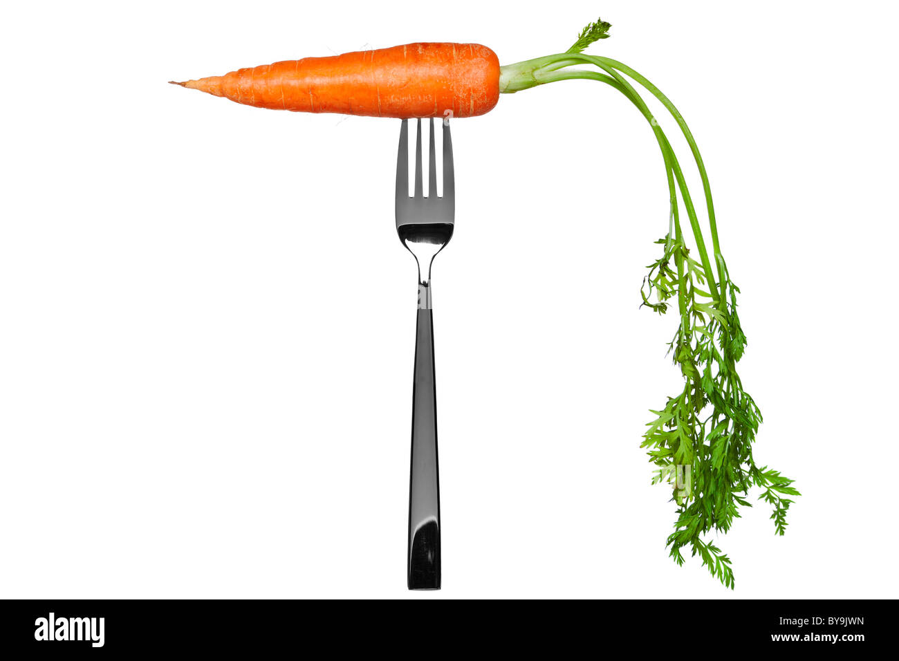 Photo of a carrot on a fork isolated on a white background, part of a series. Stock Photo