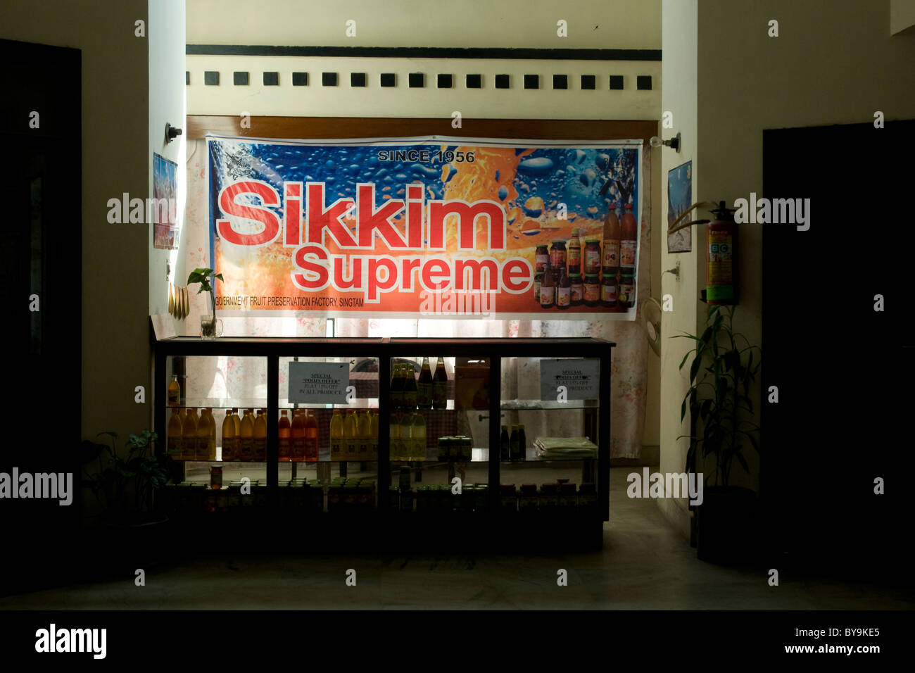 Brightly lit Sikkim sign within the Ringpo Hotel at the frontier between West Bengal and Sikkim states, India Stock Photo