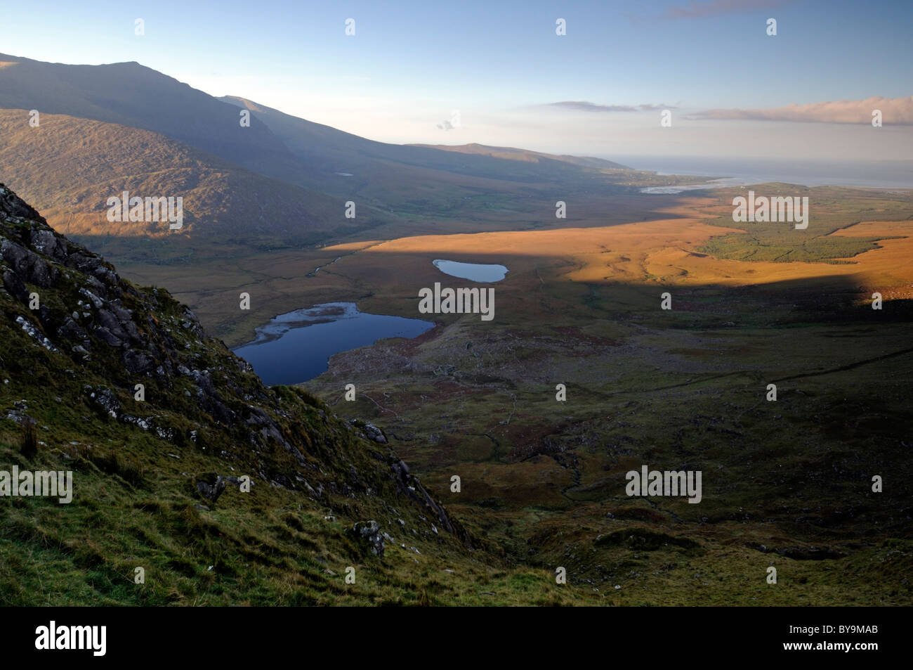 Soft light over the brandon mountains along the Conor pass near Dingle County Kerry Ireland scenic scene viewpoint Stock Photo