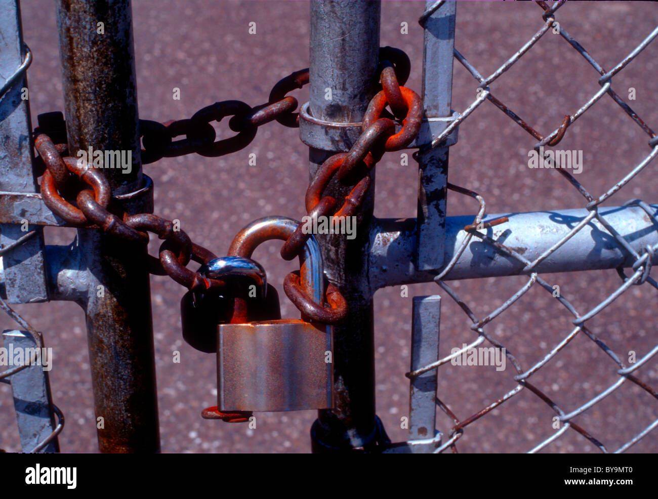 Locked gate with chains Lock Stock Photo Alamy