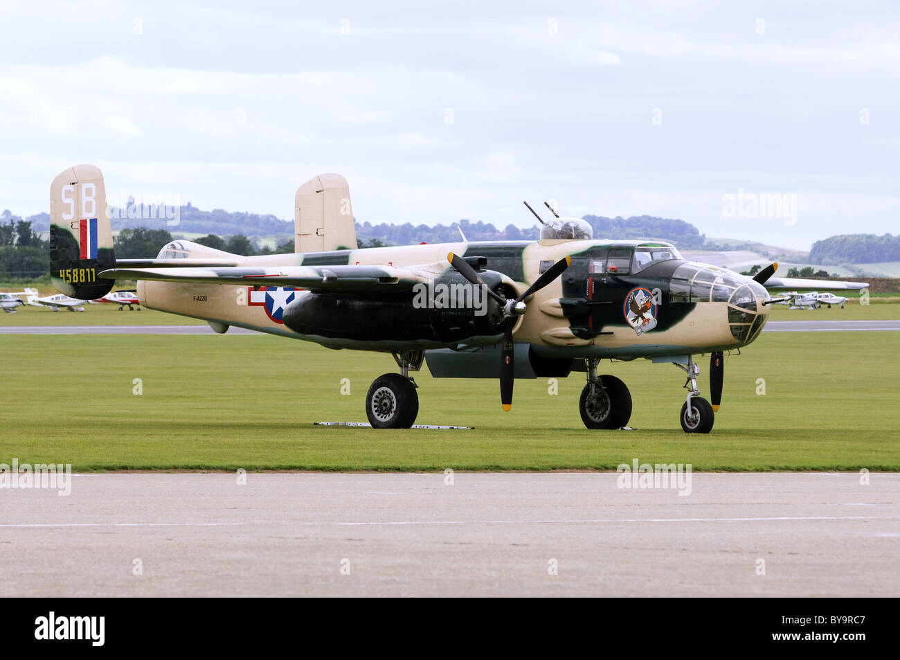 North American B-25J Mitchell in USAAF camouflage on the flightline at Duxford airfield Stock Photo