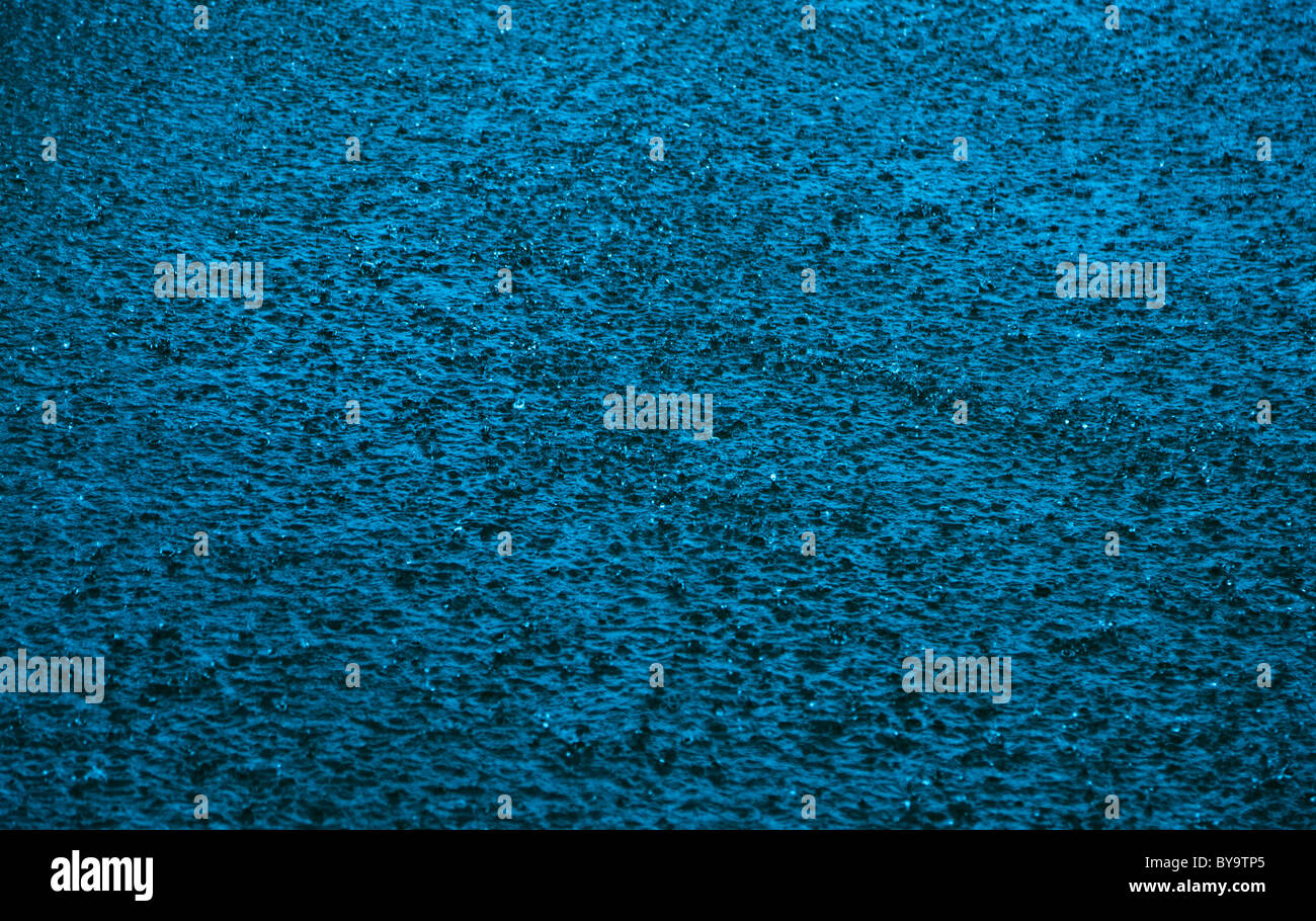 Rain pouring down on lake during a thunder storm Stock Photo