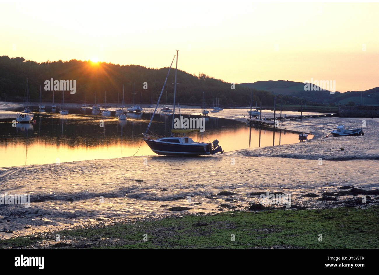 Sailing boat at sunset hi-res stock photography and images - Alamy