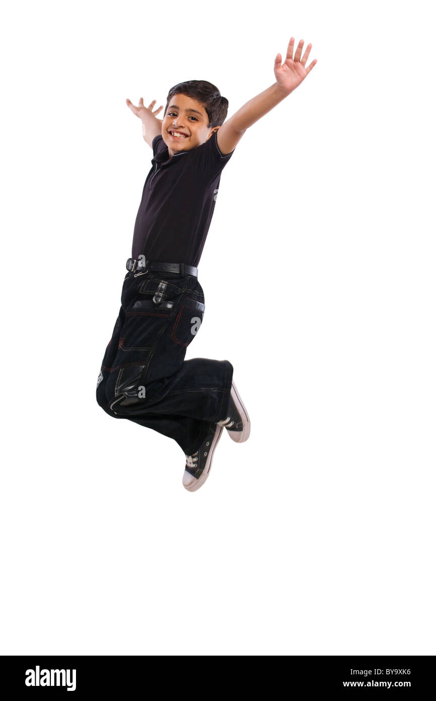 Boy jumping in the air Stock Photo