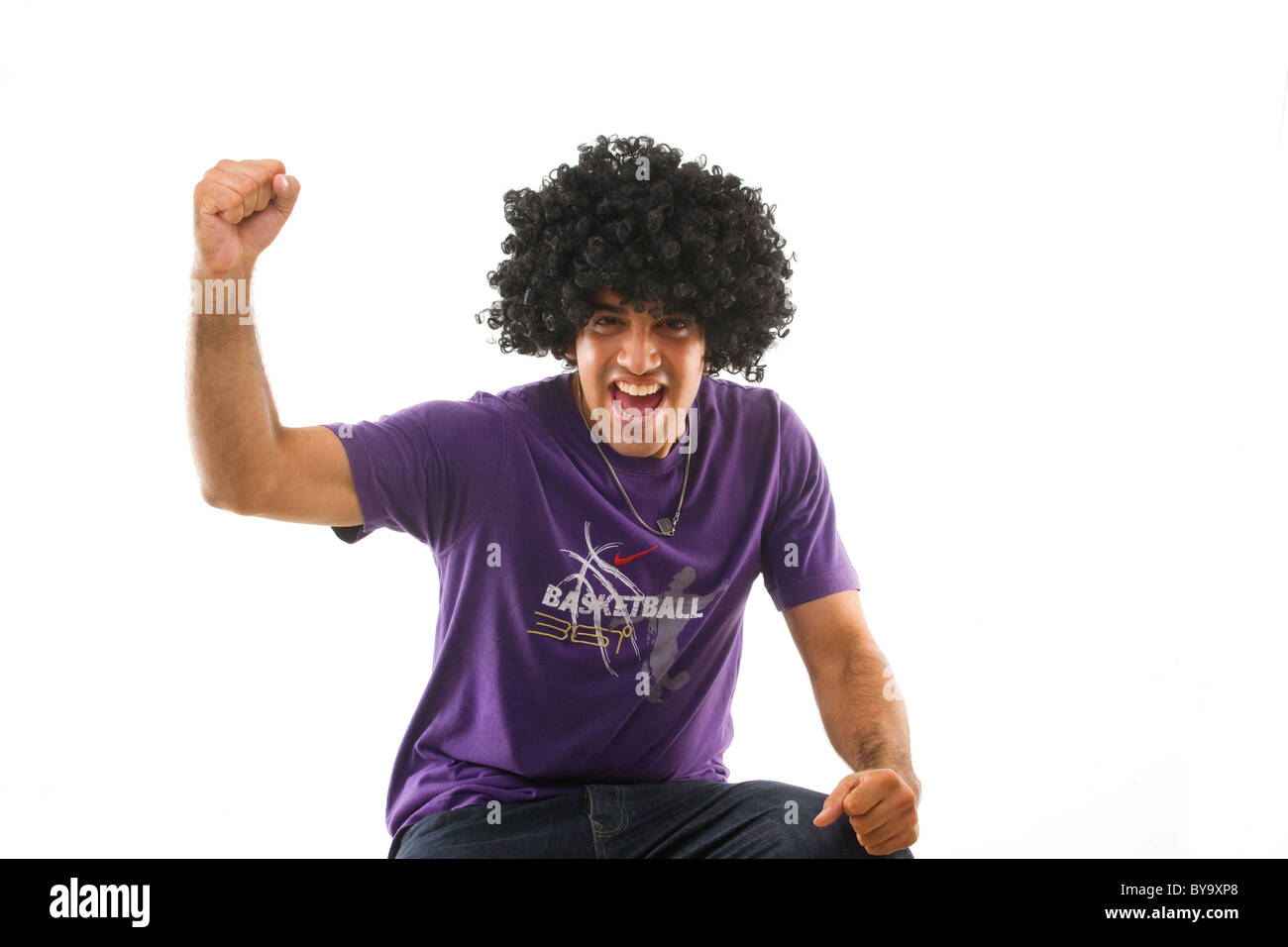 Man with an afro wig Stock Photo