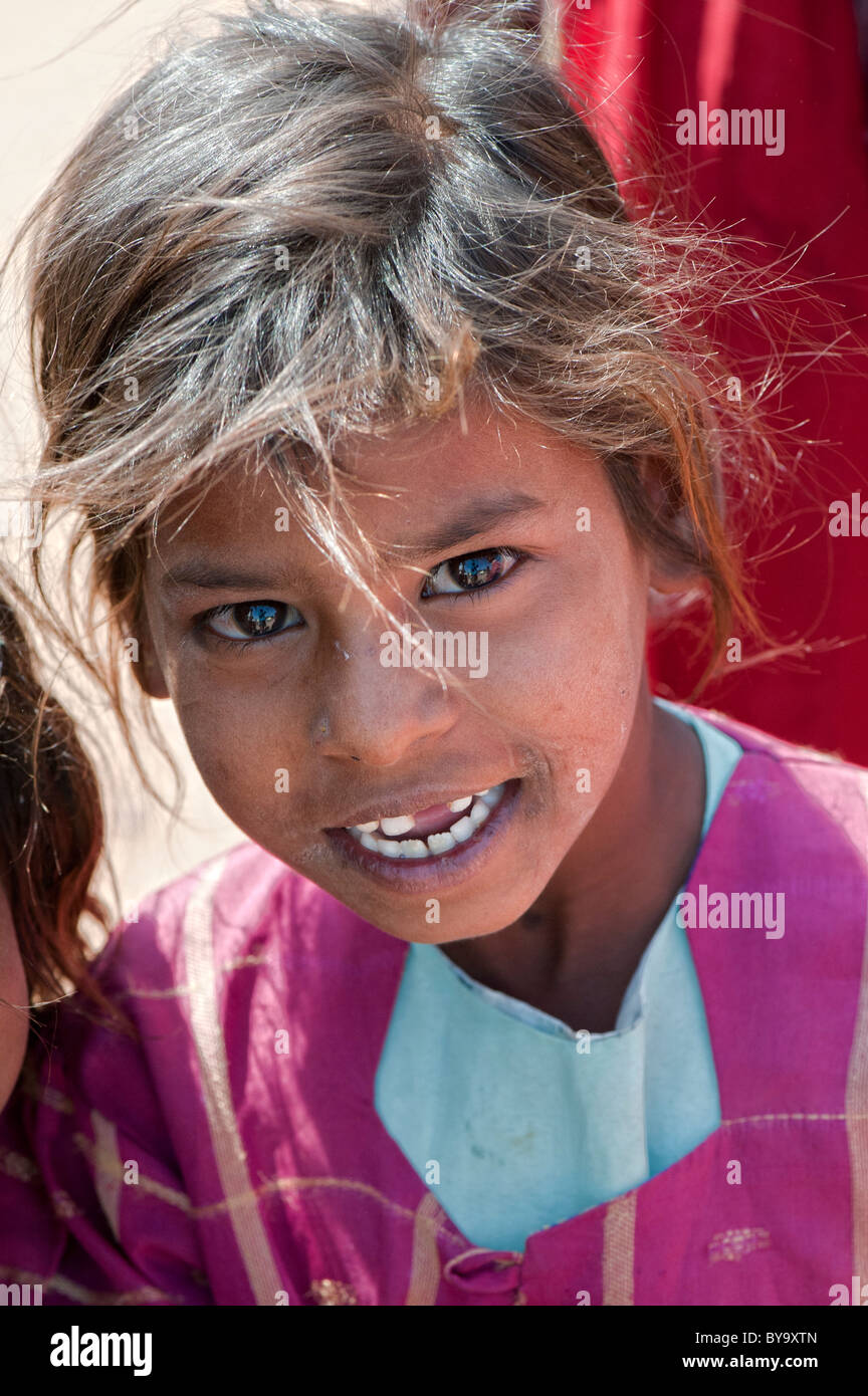 Happy young poor lower caste Indian street girl smiling. Andhra Pradesh, India Stock Photo