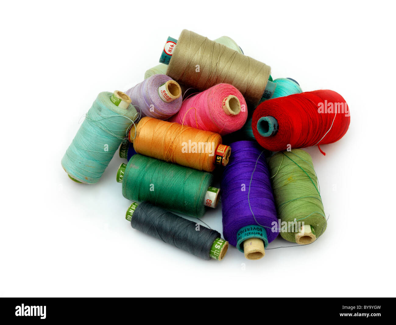 Pile Of Spools Of Colourful Cotton Stock Photo - Alamy