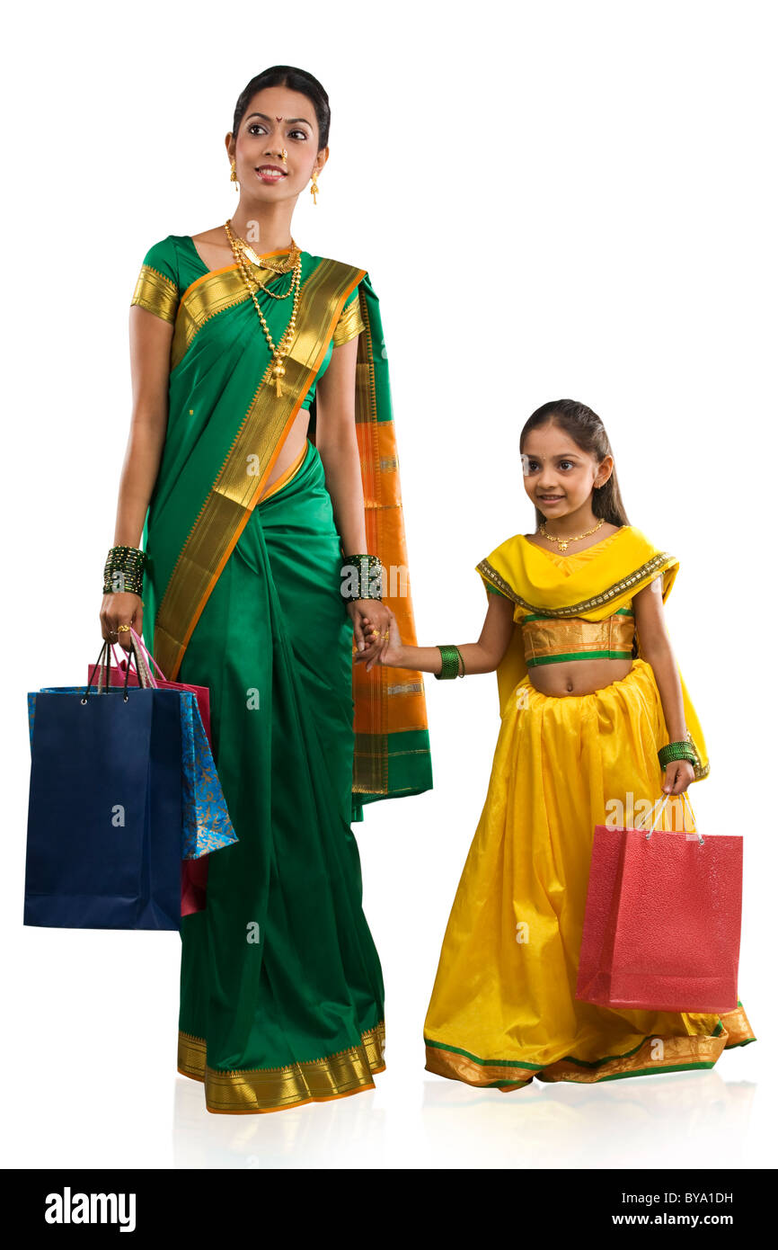 Mother and daughter with shopping bags Stock Photo