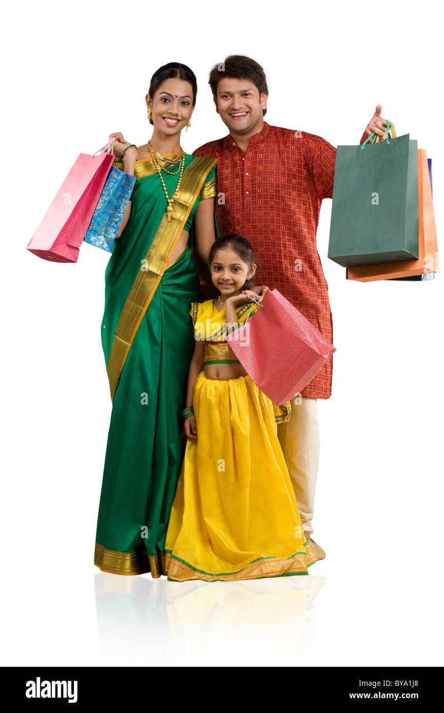 Portrait of a family with shopping bags Stock Photo