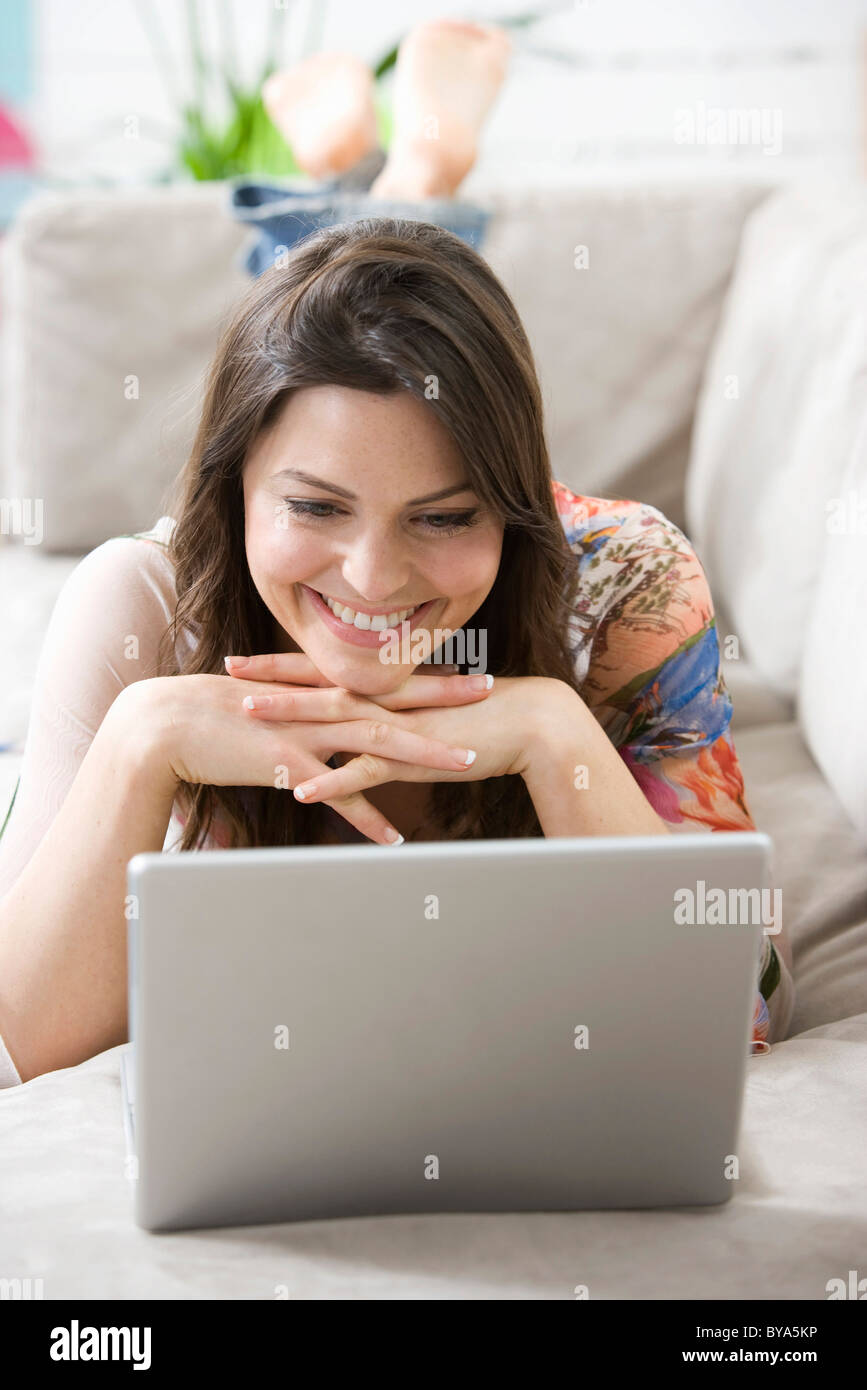 Woman at home on the computer Stock Photo - Alamy