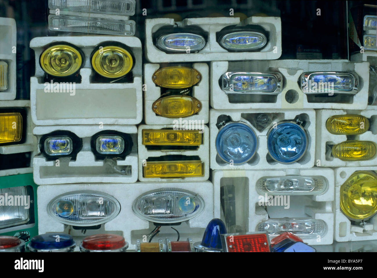 Shop window displaying car headlights Stock Photo Alamy