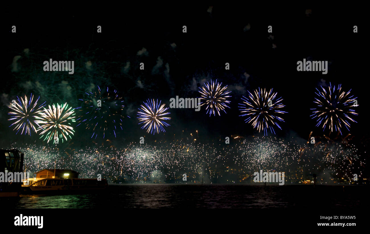 Fireworks celebrating Australia Day explode over the Swan River in Perth, Western Australia. Stock Photo