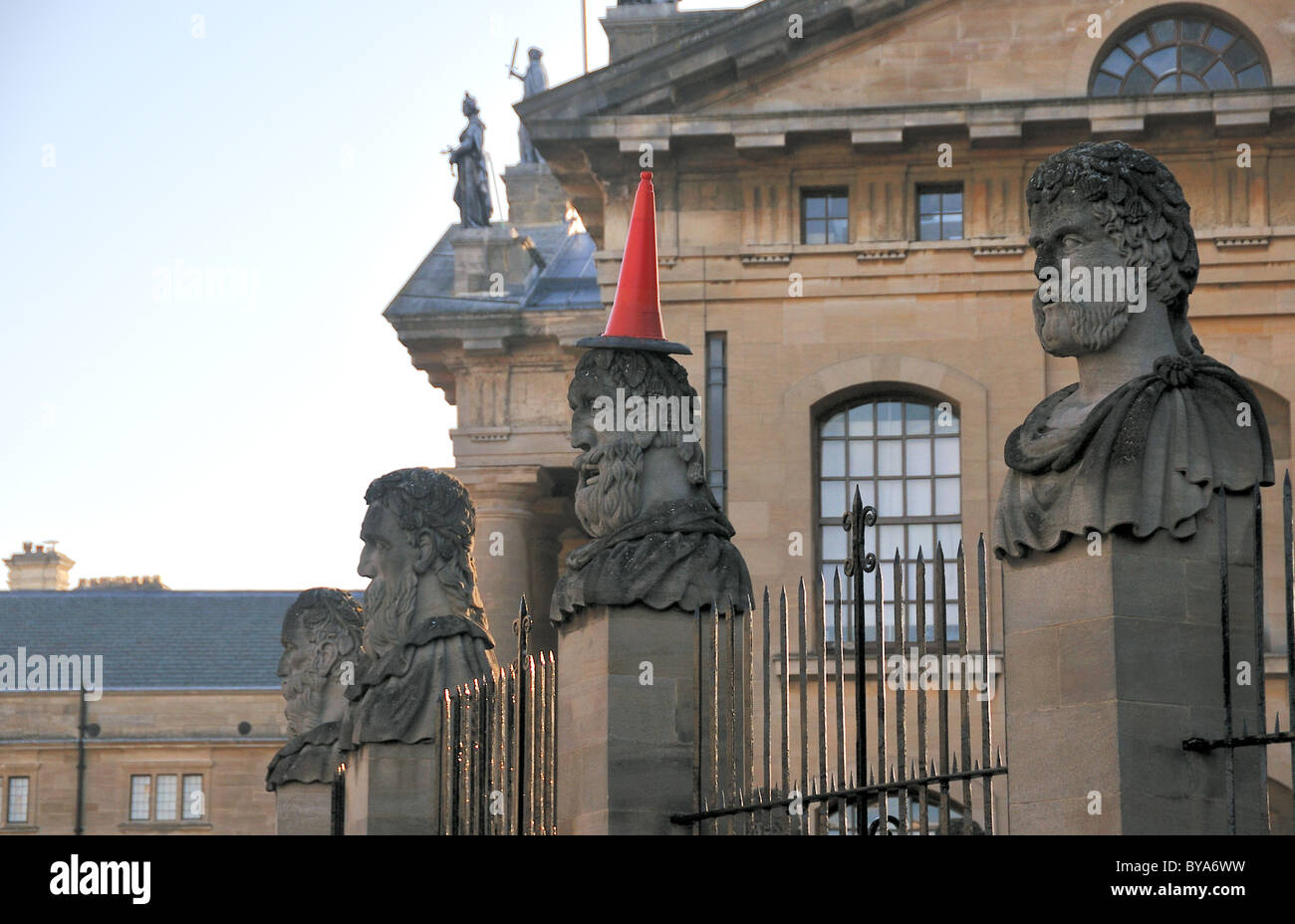 Statue with traffic cone on head, Sheldonian Theatre, Oxford, UK Stock